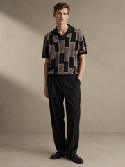 Architectural Geometry Knit Polo — styled