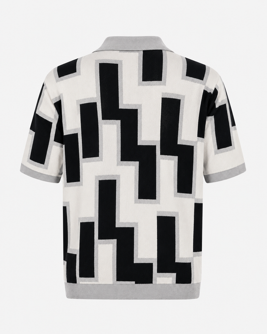 Ivory & black jacquard knit polo — back view showing architectural pattern and heathered grey rib trims
