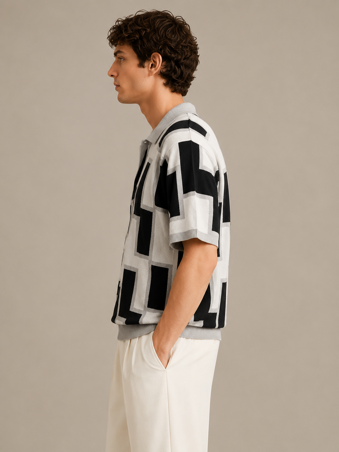 BLACKSTONE Tessellate Polo in Ivory Multi — side view of relaxed-fit silhouette